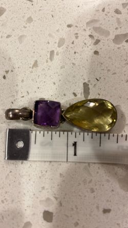 Unmarked citrine and amethyst pendant