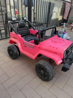 Pink electric car for toddlers