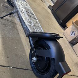 Electric scooter with shock absorber