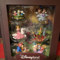 Disneyland resort storybook Christmas ornament set retired Disney parks exclusive .