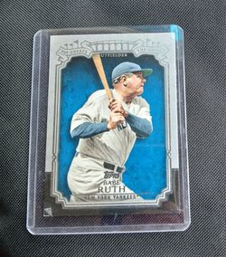 Babe Ruth card in a hard protective case.  $10