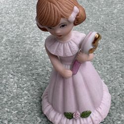 Vintage 1982 Enesco age, 5 brunette porcelain figurine from the growing up girls collection