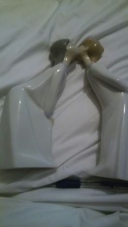 Lladro kissing boy and girl