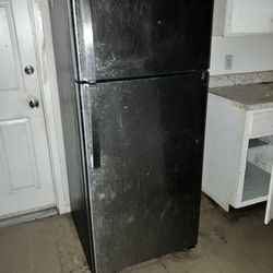 GE® 18.3 Cu. Ft. Black Top Freezer Refrigerator