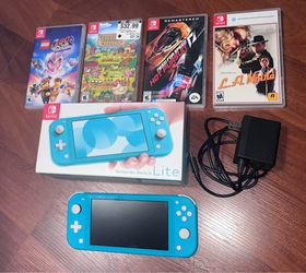 Nintendo Switch Lite w/ Games