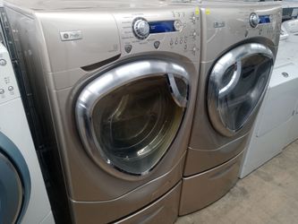 GE Profile tan front load washer and dryer set on pedestals - Free delivery