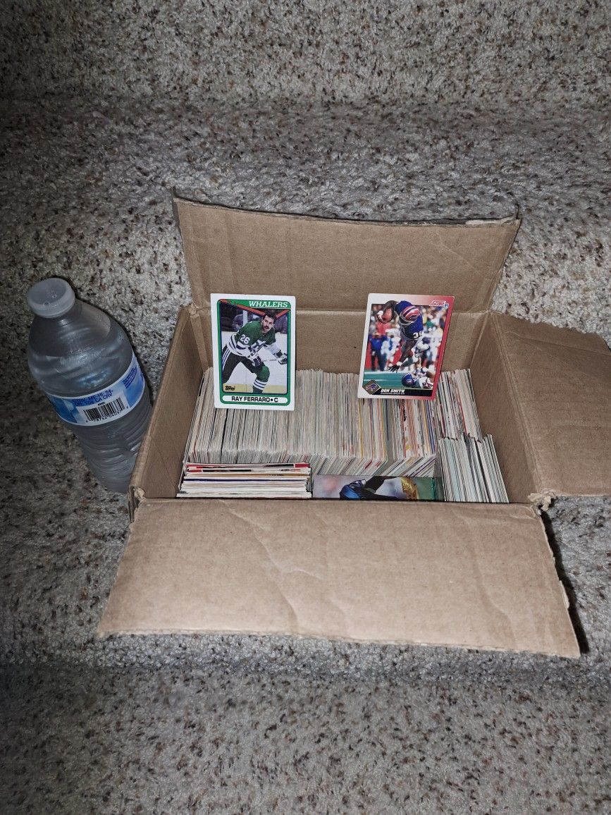 A Box Of Approximately 5-600 Hockey/Football Cards All For 1 Price (Only Available In Fridley Minnesota)