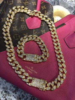 New 18 k yellow gold Cuban chain and bracelet