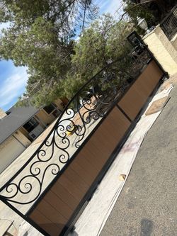 Wrought Iron Driveway Gate with Wood Panels