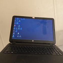 HP 15” Laptop – Good Condition + Charger & Mouse Included