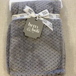 Hudson Baby Infant Plush Waffle Blanket, identified by its waffle texture and "Betty & Bob" branding