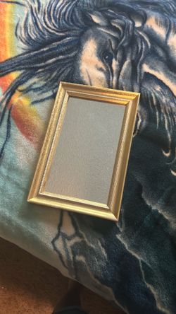 Gold framed mirror