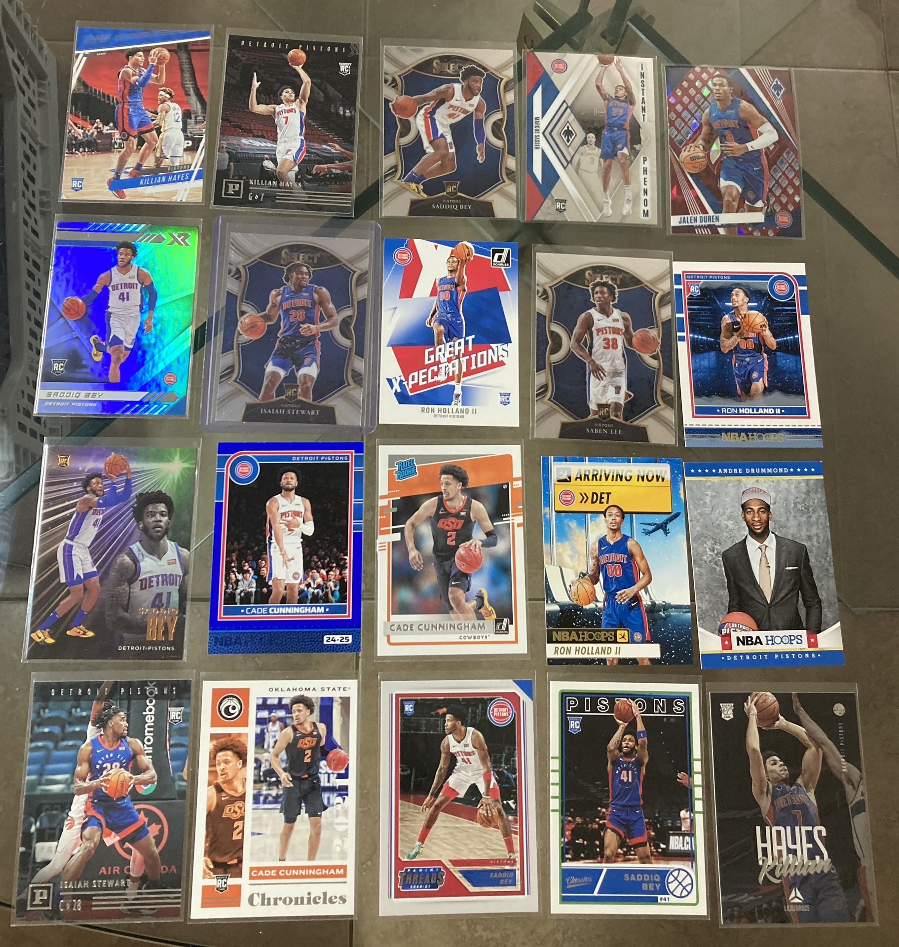 20 card NBA basketball Pistons Cade Cunningham rc Prizm Select Hoops etc All cards are In good condition near mint to mint - gem. .