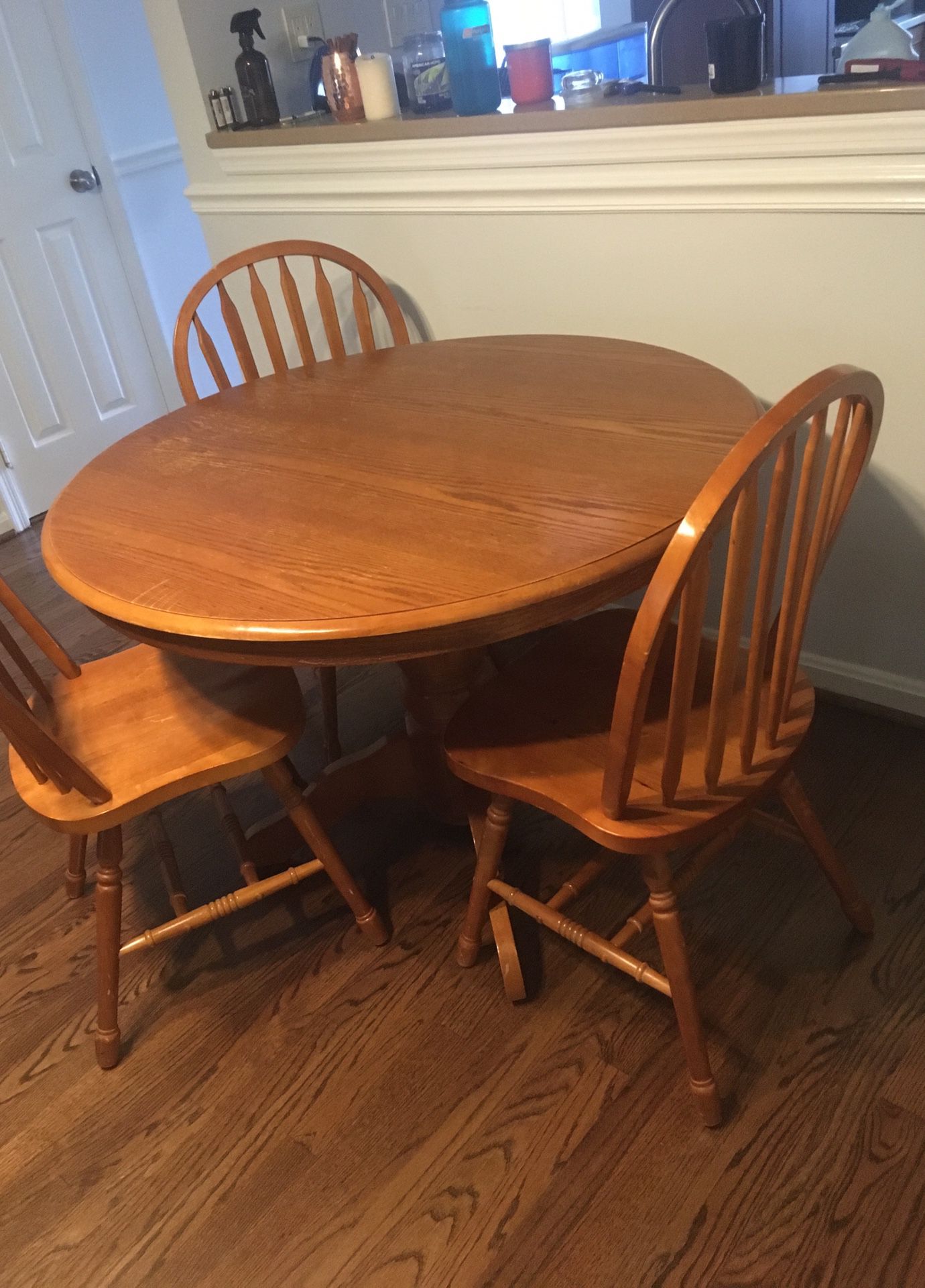 Table and three chairs for sale