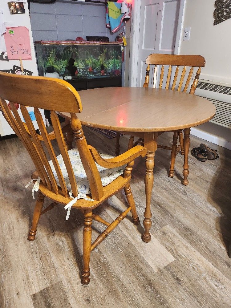 Wooden kitchen table nice and solid 