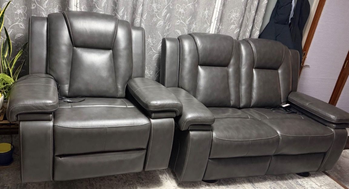 Leather Loveseat And Rocking Recliner