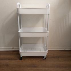 Small plastic rolling utility cart