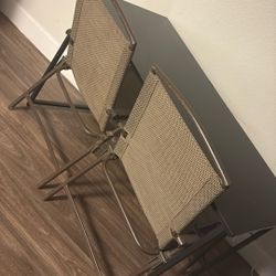 Table And Two Folding Chairs