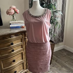 Woman’s light pink dress size 10