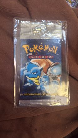 Pokemon original sealed vintage 1999 Wizards of the Coast (WOTC) Pokémon Base Set Unlimited booster pack with the iconic blastoise artwork.