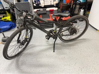 REI REV CTY 24” bike