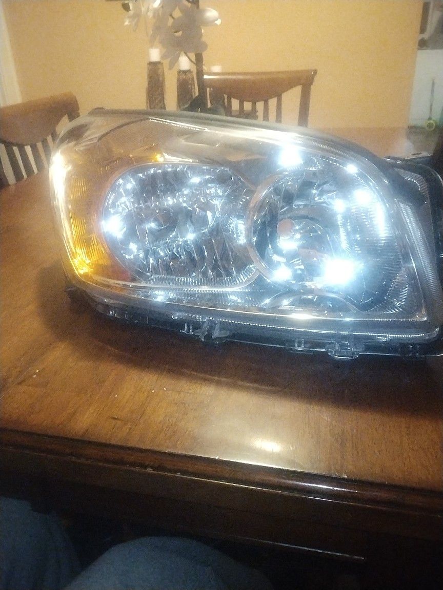 Brand new 07 Rav4 Passenger headlight asking 50 obo!!