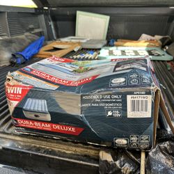 Camping, twin air mattress by Intex with self pump and self deflate