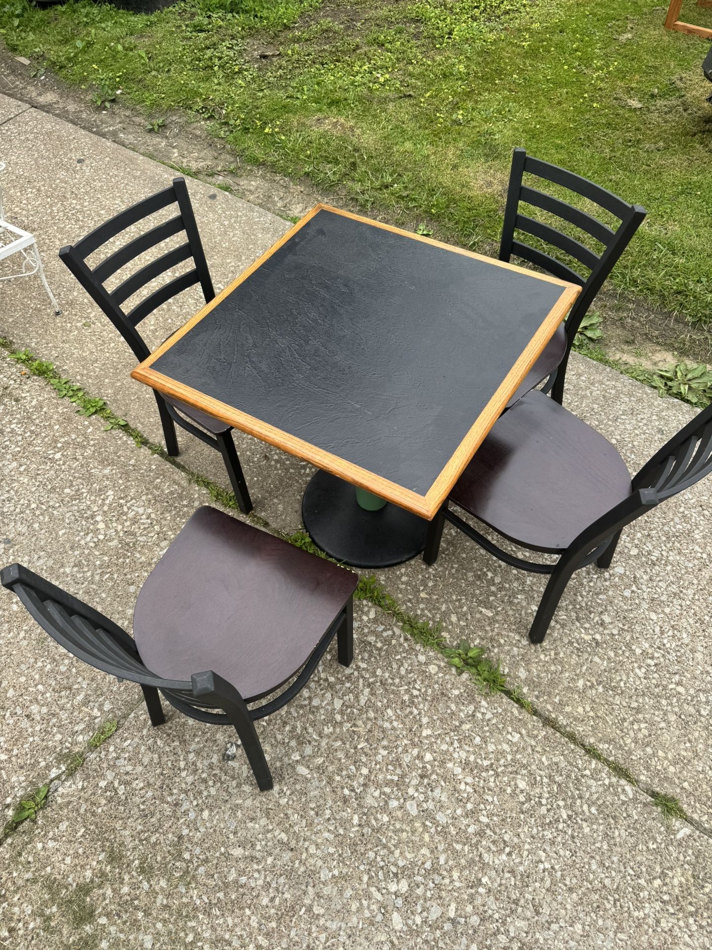 HEAVY TABLE W/ 4 CHAIRS