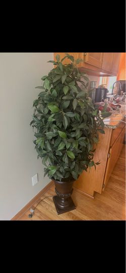 Large artificial Tree with lights and urn planter