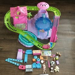 Discontinued polly pocket roller coaster Tresort playset 2009