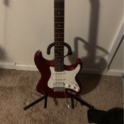 Guitar With Amp And Chord Barely Used 