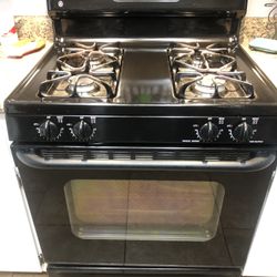 Stove, Dishwasher, Table And Dresser