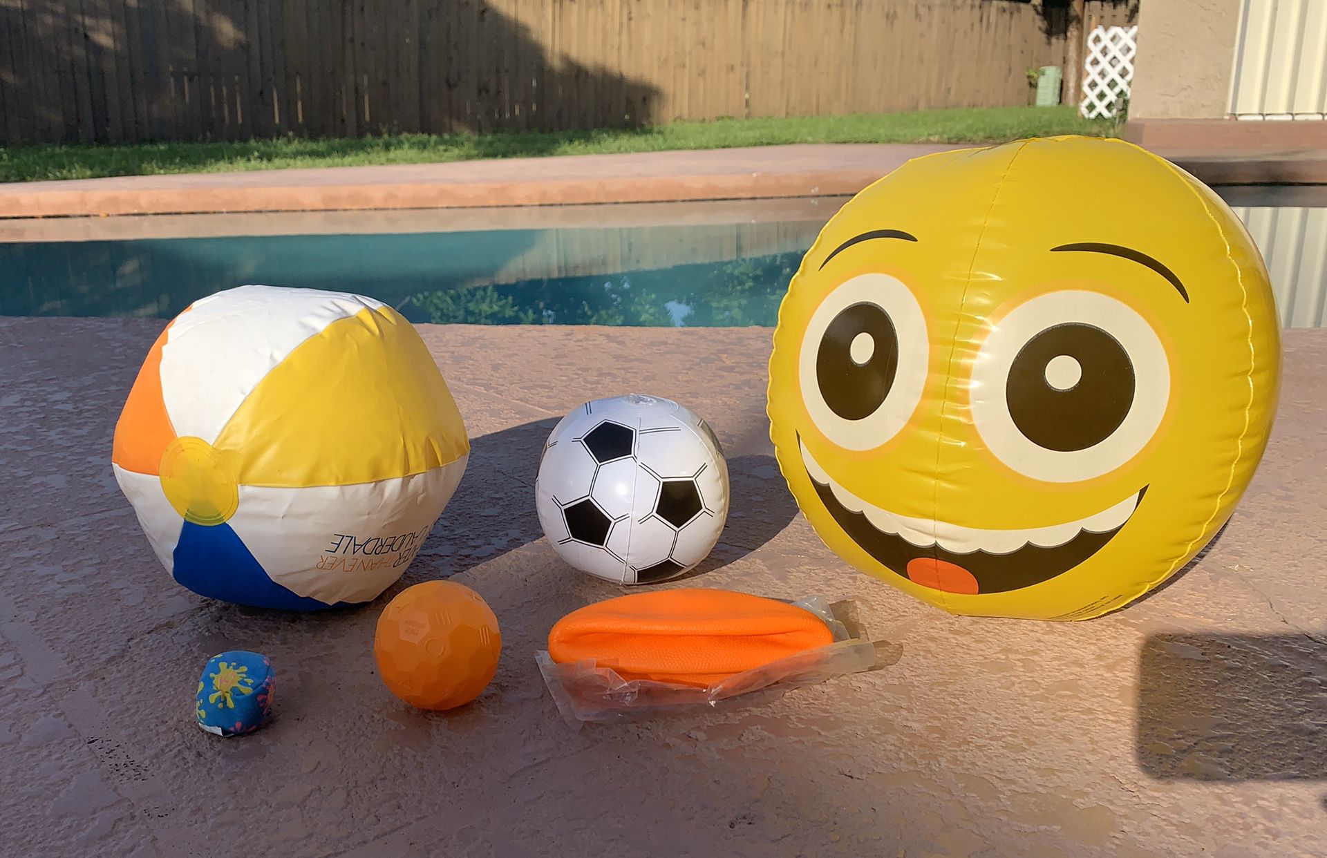 6 new & like new beach balls and pool toys