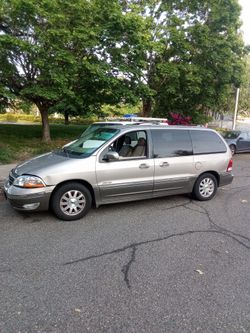 2000 Ford windstar light damage in front small crack in radiator everything works power side double doors