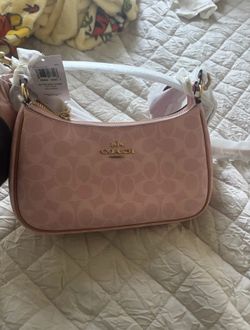 teri powder pink coach