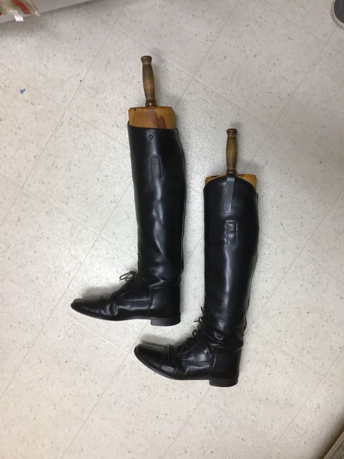 Antique leather riding boots and wood laths- display only