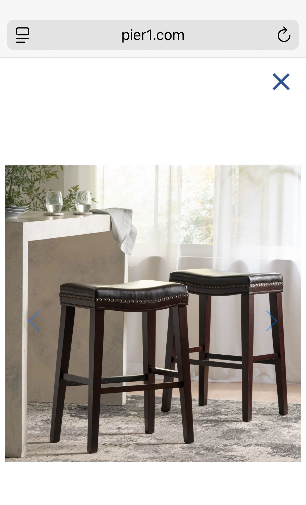 BOGO! Two brand new leather upholstered saddle bar stools with nailhead trim