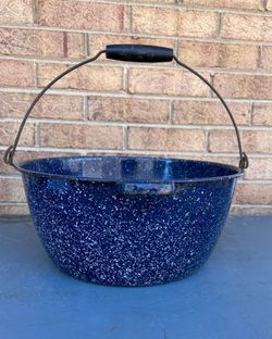 Blue enamelware pot bucket with bake wooden handle.