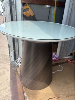 Revolving table with glass