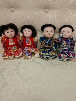 Vintage porcelain Oriental dolls