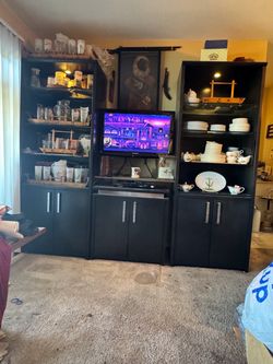 Modern executive entertainment center/bookshelves./