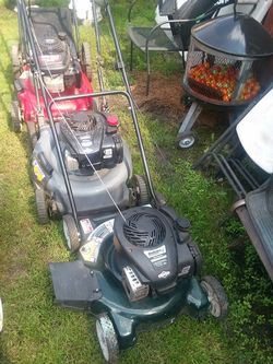 Working Regular and Self Propelled lawnmowers