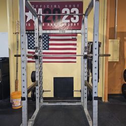 Commercial Squat Racks; 1-Atlantis I/2 Rack. 1 Hammer Strength Full Rack