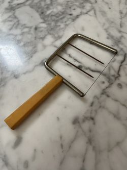 1930s 1940s Cheese Slicer with butterscotch bakelite handle, vintage Americana