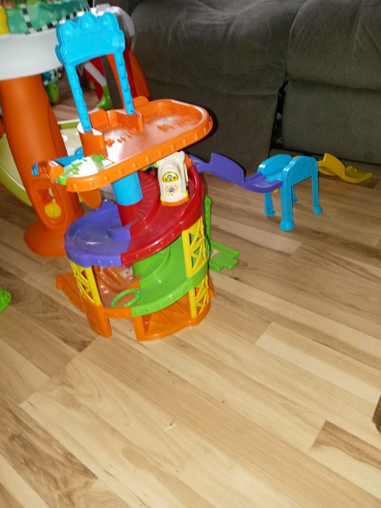 Vtech Vehicle Tower With 4 Cars.