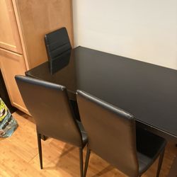 Glasstop Small Dining Table And 3 Chairs 