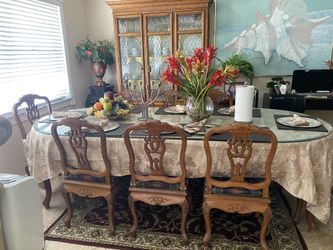 Dining Table and 8 Chairs ( China Not Included)