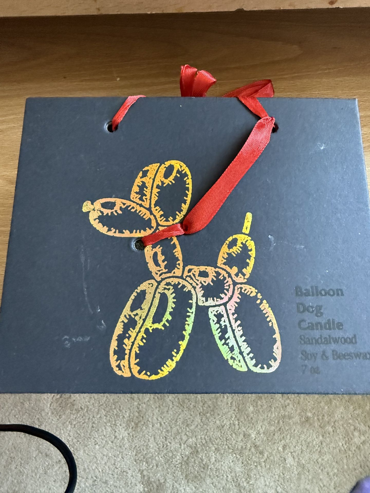 Balloon dog candle never used with carrying box