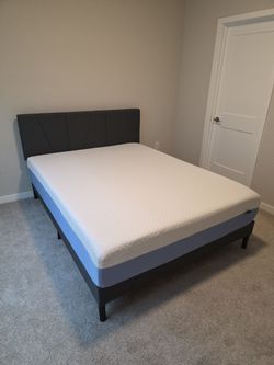 Queen size platform bed with memory foam mattres