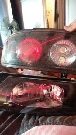 Nissan Altima headlights& taillights black altezza.